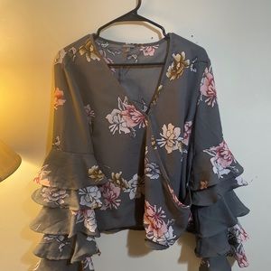 It has beautiful sleeves, and have low v neckline